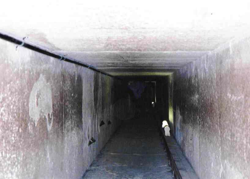 This photograph shows how small the tunnels inside the pyramid are. You should be able to make out my brother-in-law bent over almost double in the passage. This is the passage leading to the Queen's chamber. For some reason when our group was allowed into the pyramid, all the other people rushed to get into the King's chamber, making loads of noise, so we went to the queens chamber instead and managed to spend a couple of peaceful minutes looking around before we were joined by others.